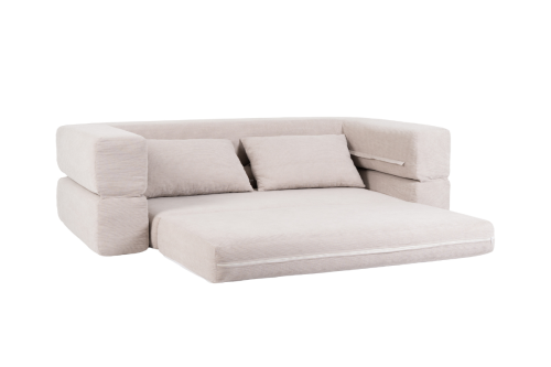 Beżowa sofa PUFLO Velvet do salonu.png