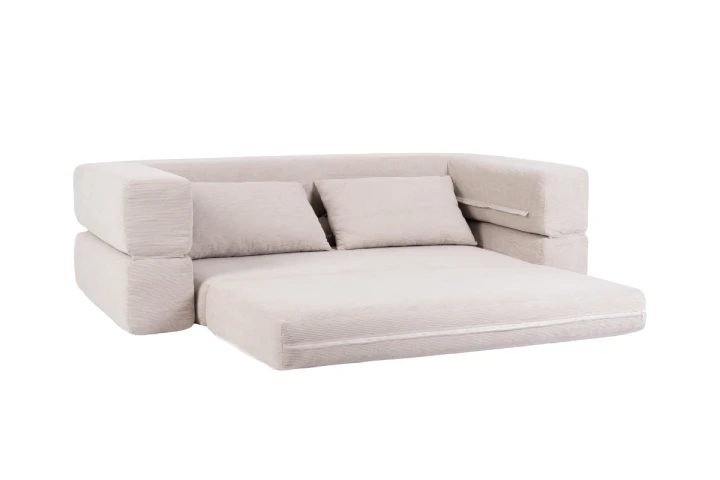 Beżowa sofa PUFLO Velvet do salonu.png
